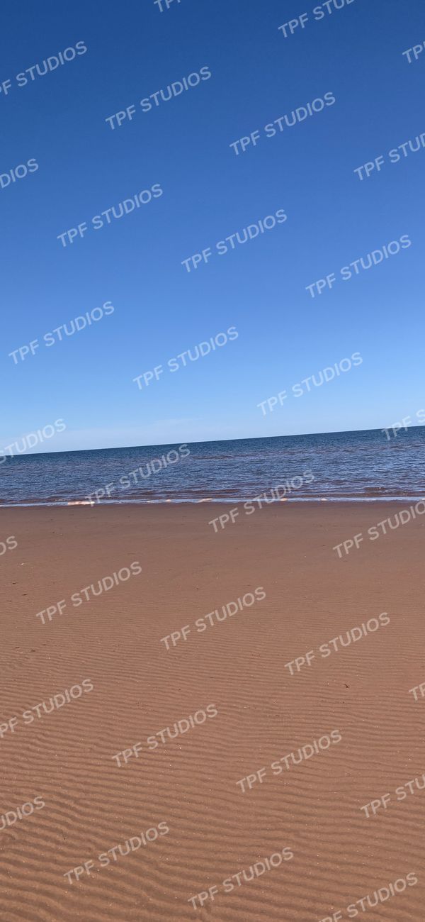 Red sand, blue sky